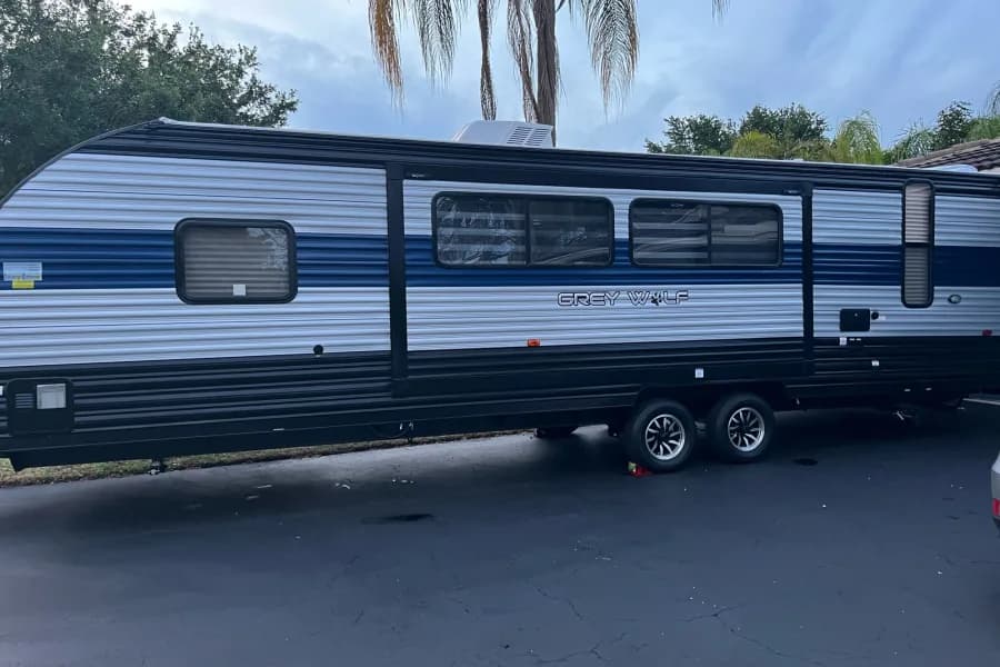 Wolf Den Adventures - 2022 Grey Wolf Limited 33ft. Travel Trailer RV rental in Miami Florida — exterior